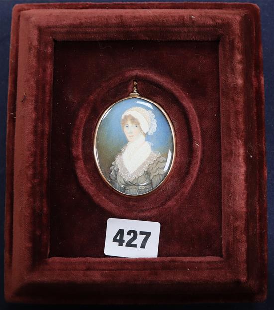 English School (19th century), miniature head and shoulder portrait of a lady wearing a lace cap, hairpiece back,